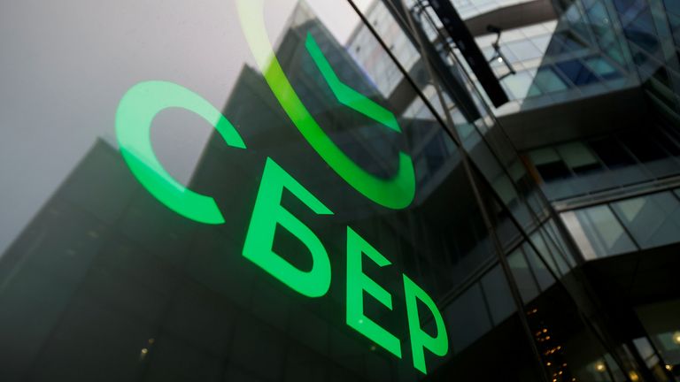 FILE PHOTO: The logo of Russia&#39;s largest lender Sberbank in one of its offices in Moscow, Russia, December 24, 2020
