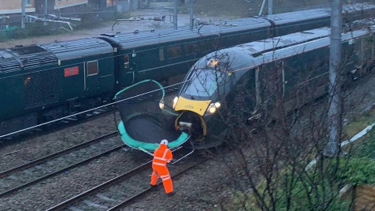 A train named after Sir Captain Tom Moore was stuck for two hours after it hit a trampoline just outside Cardiff Central station. 