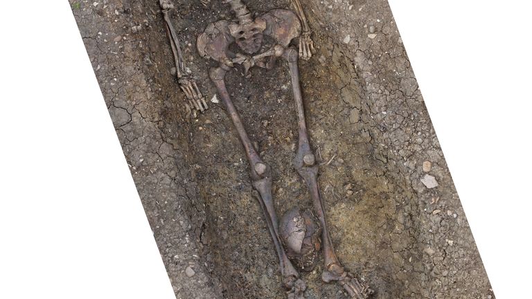 Around 40 beheaded skeletons are among 425 bodies exhumed by HS2 archaeologists after being found in a large Roman cemetery in Fleet Marston near Aylesbury, Buckinghamshire.