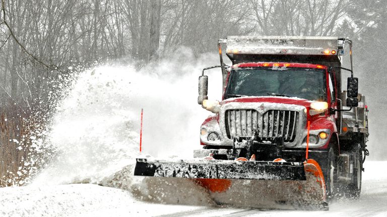 Roads had to be cleared after snow fell on Ohio