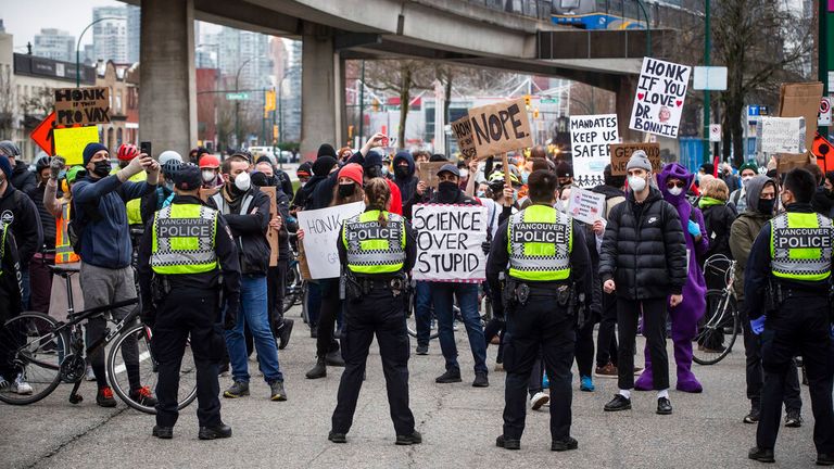 Police and protesters come face to face  in Vancouver. Pic: AP