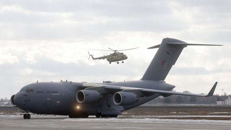A C17 Globemaster III aircraft of the Royal Air Force, transporting a shipment of Britain&#39;s support package for Ukraine, drives along the tarmac shortly after landing at the Boryspil International Airport outside Kyiv, Ukraine, February 9, 2022. REUTERS/Valentyn Ogirenko
