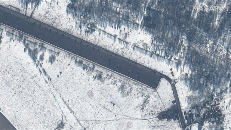 Nearly 20 attack helicopters can be seen on the runway at Zyabrovka airfield.