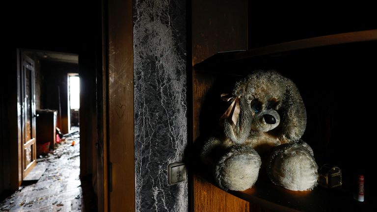 A toy is seen inside a damaged residential building, after Russia launched a massive military operation against Ukraine, in Kyiv, Ukraine February 25, 2022. REUTERS/Umit Bektas
