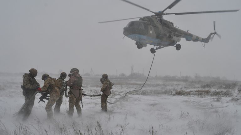 Service members of the Ukrainian Armed Forces take part in military drills in the Kherson region, Ukraine, in this handout picture released February 10, 2022. Ukrainian Armed Forces Press Service/Handout via REUTERS ATTENTION EDITORS - THIS IMAGE HAS BEEN SUPPLIED BY A THIRD PARTY.
