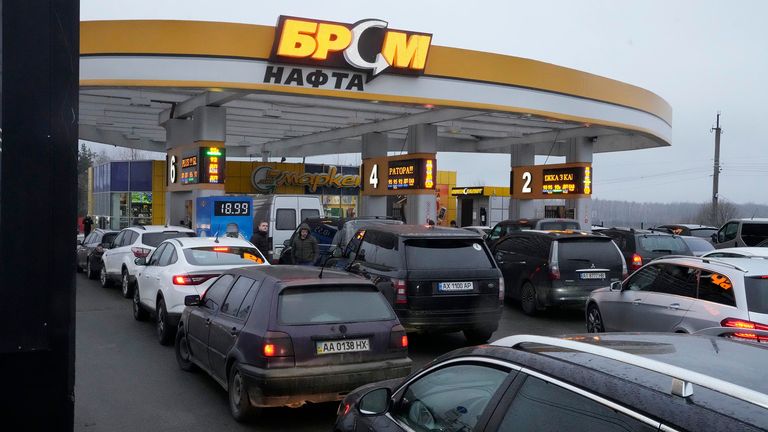Vehicles line up to a gasoline station in Kyiv, Ukraine, Thursday, Feb. 24, 2022. Russian troops have launched their anticipated attack on Ukraine. Big explosions were heard before dawn in Kyiv, Kharkiv and Odesa, as world leaders decried the start of an Russian invasion that could cause massive casualties and topple Ukraine&#39;s democratically elected government. (AP Photo/Efrem Lukatsky) PIC:AP