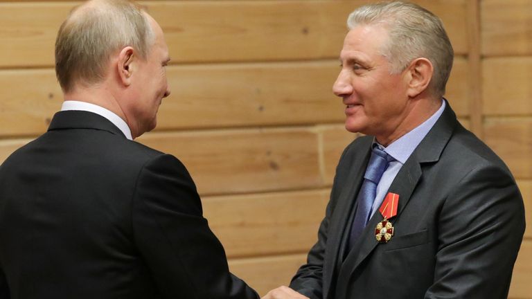 Russian President Vladimir Putin shakes hands with Vice President of the Judo Federation of Russia Boris Rotenberg after awarding him with the Order of Alexander Nevsky during a meeting at the Turbostroitel judo club in Saint Petersburg, Russia November 27, 2019. Sputnik/Mikhail Klimentyev/Kremlin via REUTERS ATTENTION EDITORS - THIS IMAGE WAS PROVIDED BY A THIRD PARTY. 