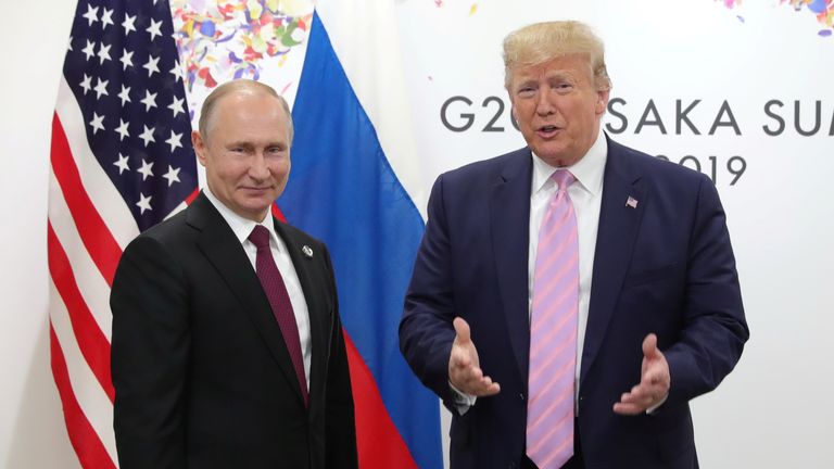 The aggressive strategy adopted by Vladimir Putin (left) has been praised by Donald Trump. File pic