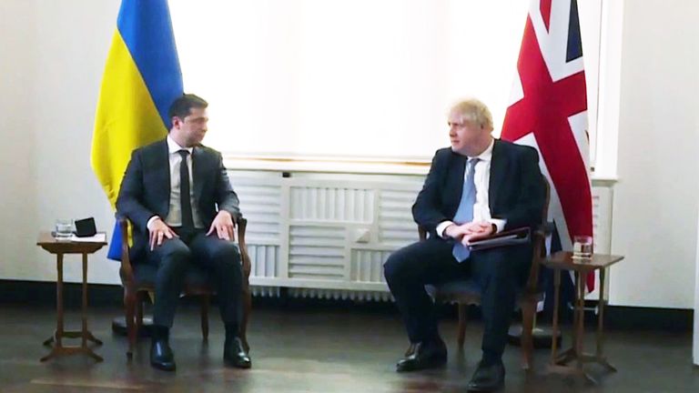 Ukrainian President, Volodymyr Zelenskyy, speaks with Boris Johnson at the Munich security conference