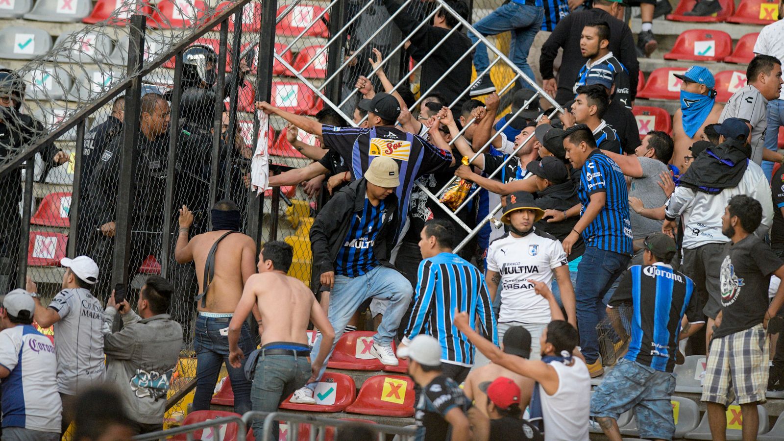 Football storm pitch in Mexico brawl breaks out | World | Sky News