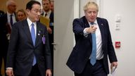 Japanese Prime Minister Fumio Kishida and British Prime Minister Boris Johnson attend a bilateral meeting during a NATO summit to discuss Russia&#39;s invasion of Ukraine, at the alliance&#39;s headquarters in Brussels, Belgium March 24, 2022. REUTERS/Henry Nicholls/Pool
