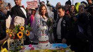 Stella Moris cuts a wedding cake outside HMP Belmarsh, south east London, after her wedding ceremony inside the jail to WikiLeaks founder Julian Assange where he has been held for three years. Picture date: Wednesday March 23, 2022.


