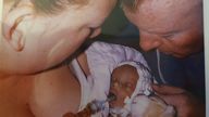 Sophiya Hotchkiss with her parents in intensive care before she died