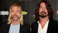 Hawkins (left) and Dave Grohl at the 2013 Rock and Roll Hall of Fame induction ceremony