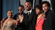 Will Smith holds his Oscar while posing with his wife Jada Pinkett Smith (L), daughter Willow Smith (2nd L), son Jaden Smith (2nd R) and son Trey Smith (R) as they arrive at the Vanity Fair Oscar party during the 94th Academy Awards in Beverly Hills, California, U.S., March 27, 2022. REUTERS/Danny Moloshok