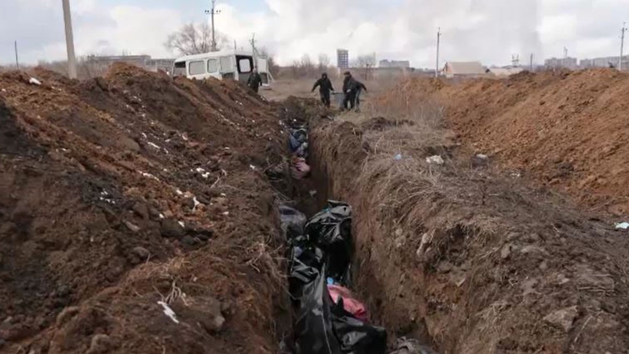 Ukraine War: Dozens Of Bodies Wrapped In Bags Or Carpet Buried In ...