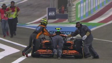 Norris helps push stricken McLaren