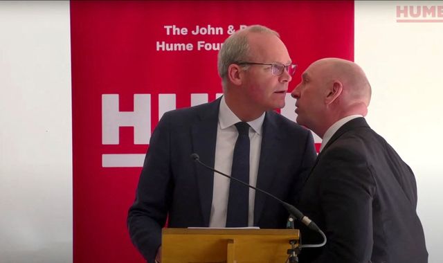Woman arrested after Ireland's foreign minister taken off stage at peace event in Belfast in hoax security alert - Vimarsana News