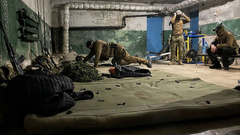 Volunteer soldiers bed down for the night in a basement in a village just outside of Chernihiv. They are trying their best to get civilians out of the besieged city.