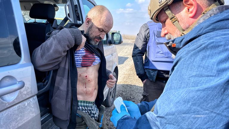 A paramedic called Yuri was shelled trying to help civilians evacuate the city. He’s got multiple shrapnel injuries and asks our team to help him