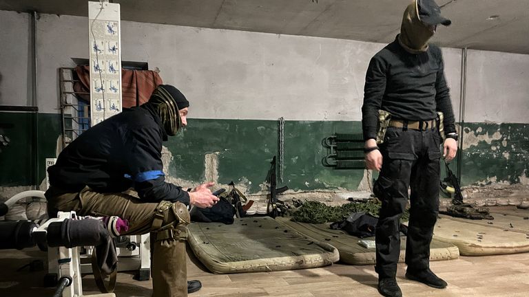 Volunteer soldiers bed down for the night in a basement in a village just outside of Chernihiv. They are trying their best to get civilians out of the besieged city.