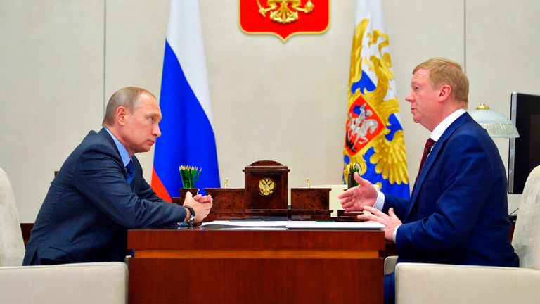 Mr Chubais (right) with Vladimir Putin in November 2016. Pic: AP