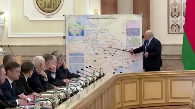 Belarusian president Alexander Lukashenko shows off a map showing Russia&#39;s &#39;special operation&#39; in Ukraine.