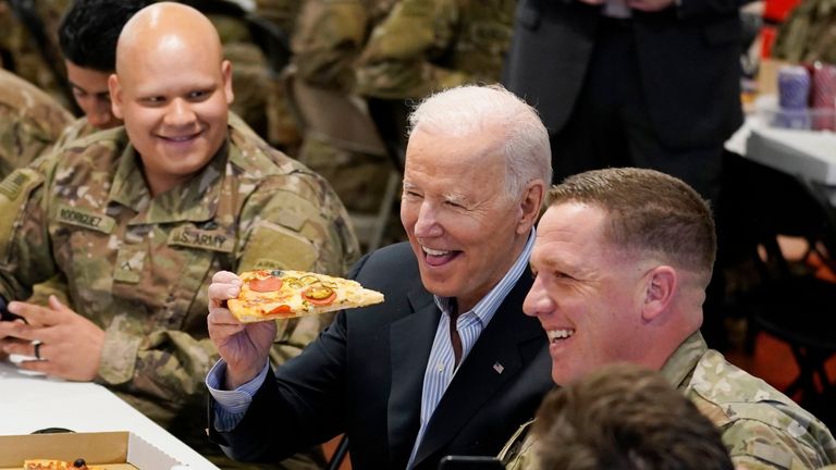 President Joe Biden visits with members of the 82nd Airborne Division at the G2A Arena, Friday, March 25, 2022, in Jasionka, Poland. (AP Photo/Evan Vucci)