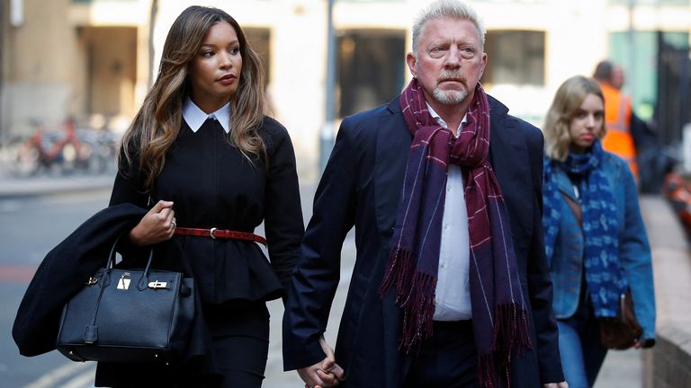 Former tennis player Boris Becker arrives with his partner Lilian de Carvalho Monteiro at Southwark Crown Court for his bankruptcy offences trial in London, Britain, March 21, 2022. REUTERS/Peter Nicholls
