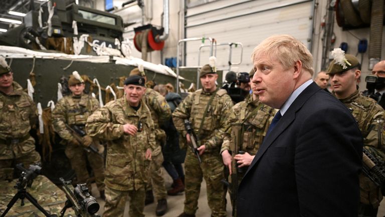 British Prime Minister Boris Johnson meets with NATO troops after a joint press conference at Army Base Tapa, in Tallinn, Estonia March 1, 2022. Leon Neal / Pool via REUTERS