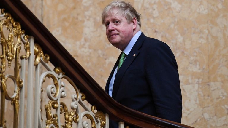 Britain&#39;s Prime Minister Boris Johnson reacts as he walks up the stairs, following a meeting of the leaders of the the Joint Expeditionary Force (JEF), at Lancaster House, in London, Britain March 15, 2022. Justin Tallis/Pool via REUTERS
