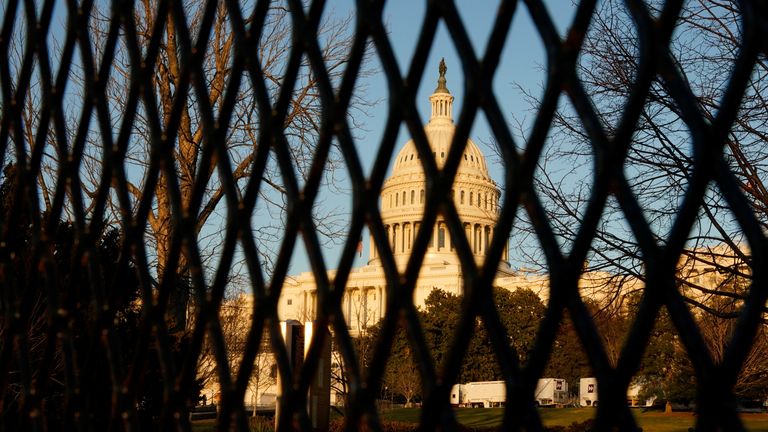 A security fence is seen ahead of U.S. President Joe Biden’s State of the Union address to a joint session of Congress outside the U.S. Capitol in Washington, U.S., March 1, 2022. REUTERS/Elizabeth Frantz