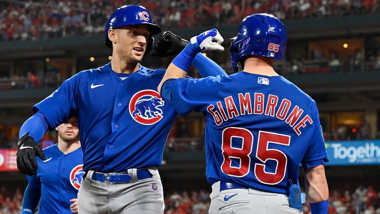Oct 2, 2021; St. Louis, Missouri, USA; Chicago Cubs right fielder Trayce Thompson (43) is congratulated by second baseman Trent Giambrone (85) after hitting a grand slam during the fifth inning against the St. Louis Cardinals at Busch Stadium