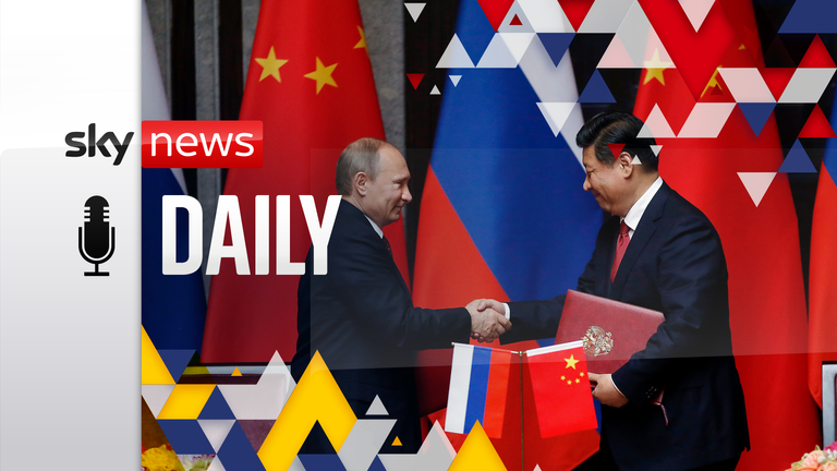 Russia&#39;s President Vladimir Putin, left, and China&#39;s President Xi Jinping shake hands after signing an agreement during a bilateral meeting at the Xijiao State Guesthouse.