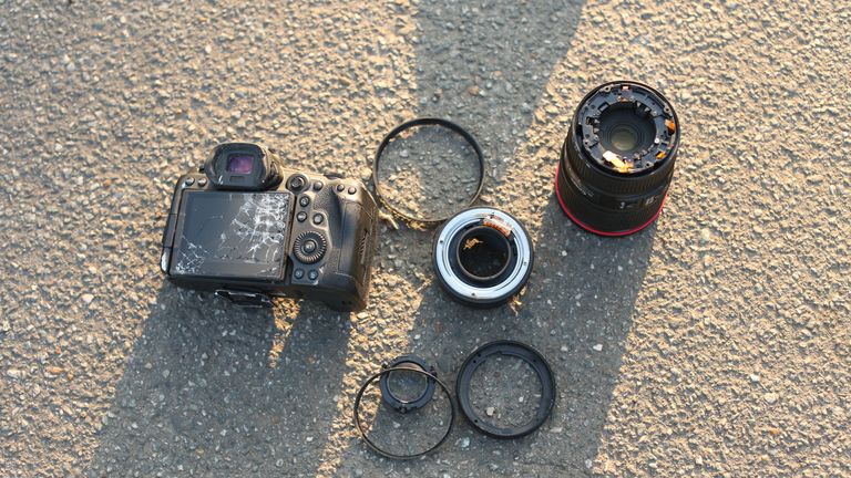 The damage caused after Dizzee Rascal, real name Dylan Mills, took a camera from a PA Media photographer outside Wimbledon Magistrates&#39; Court and threw it into a road, smashing it