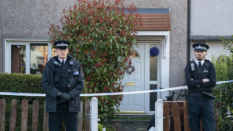  Police outside a house in St Helens after a 17-month-old girl died after being attacked by a dog. Merseyside