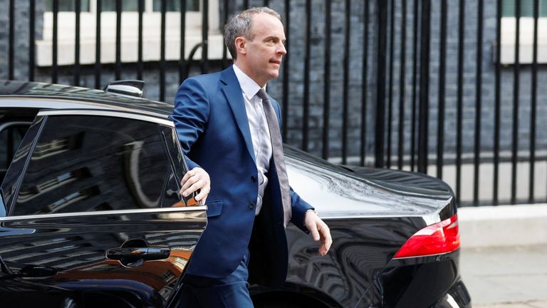 British Deputy Prime Minister and Justice Secretary Dominic Raab walks outside Downing Street, in London, Britain, March 23, 2022. REUTERS/Peter Cziborra
