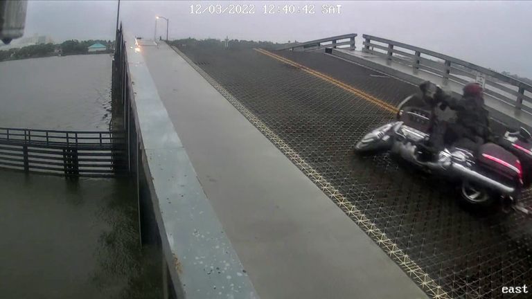 A motorcyclist drove through a lowered barrier and crashed on a rising drawbridge in Daytona Beach, Florida.
