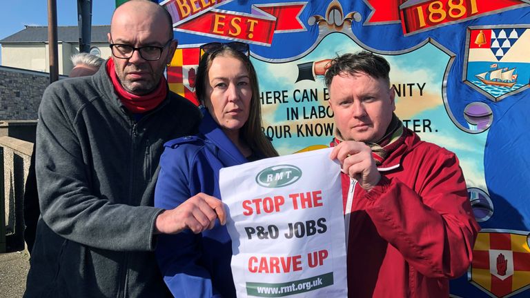 Three sacked P&O crew members - left to right, Colin Mansfield, Gail Dowey and Daniel McDonald at Larne Port in Northern Ireland