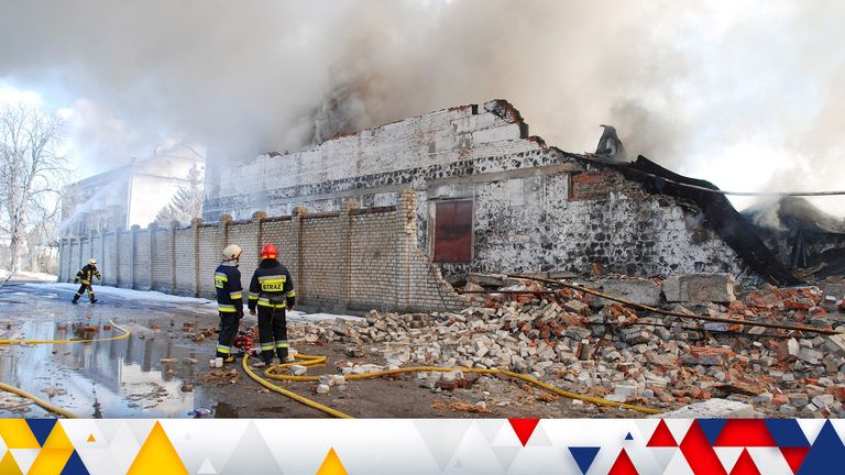 Firefighters work at a site of a warehouse fire, as Russia's invasion of Ukraine continues, in Kharkiv, Ukraine March 16, 2022. REUTERS/Oleksandr Lapshyn