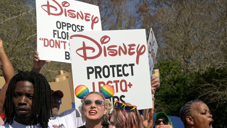 Lawyers targeted Disney at two near-simultaneous rallies in Orlando and Burbank, Calif., to urge Disney to speak out publicly in opposition to Florida hate and homophobia. "don't say gay" bill targeting LGBTQ+ youth, their families, teachers, and school counselors that is currently pending before the Florida Legislature.  (Phelan M. Ebenhack/AP Images for AIDS Healthcare Foundation)