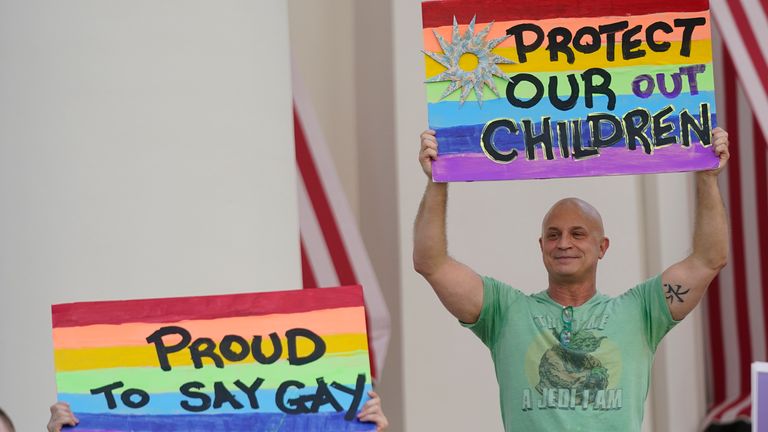 Demonstrators gather on the steps of the Florida Historic Capitol Museum in front of the Florida State Capitol, Monday, March 7, 2022, in Tallahassee, Fla. Florida House Republicans advanced a bill, dubbed by opponents as the ...Don...t Say Gay... bill, to forbid discussions of sexual orientation and gender identity in schools, rejecting criticism from Democrats who said the proposal demonizes LGBTQ people. (AP Photo/Wilfredo Lee)