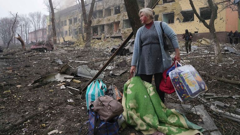 A woman walks outside a maternity hospital that was damaged by shelling in Mariupol, Ukraine, Wednesday, March 9, 2022. (AP Photo/Evgeniy Maloletka)
PIC:AP

