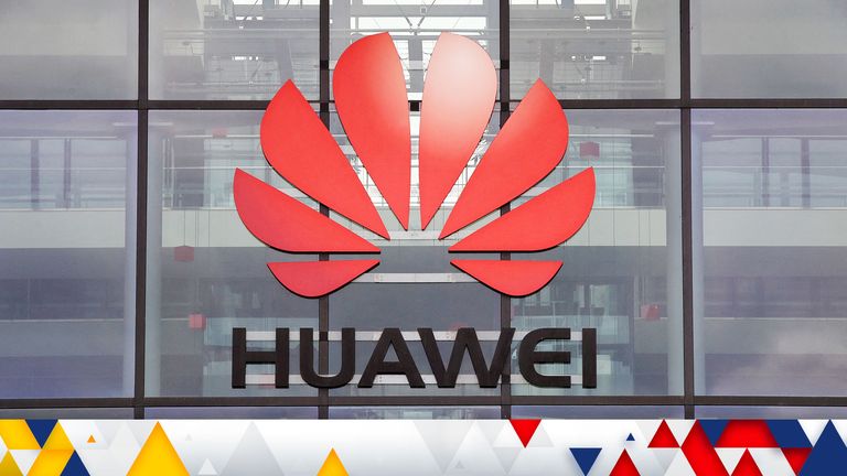 FILE PHOTO: Huawei logo is pictured on the headquarters building in Reading, Britain July 14, 2020. REUTERS/Matthew Childs/File Photo
