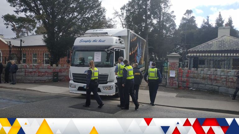 Police outside the Russian embassy in Dublin, Ireland, where a lorry has crashed into the gates 