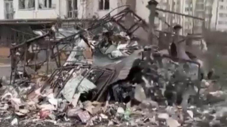 Jets fly over a residential building in Irpin before a loud explosion is heard