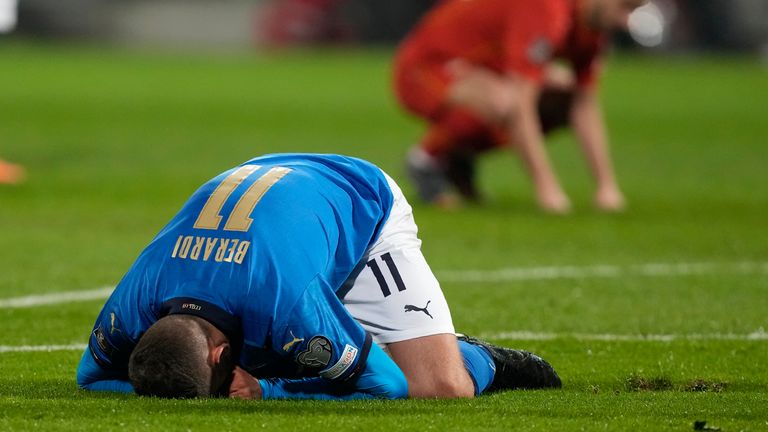 Italy&#39;s Domenico Berardi knees after missing a scoring chance during the World Cup qualifying play-off soccer match between Italy and North Macedoni