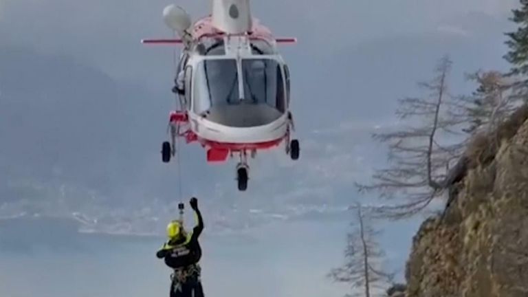 An Italian pilot has been rescued from an Alpine mountainside after his plane crashed. A British crewmate died in the incident. 