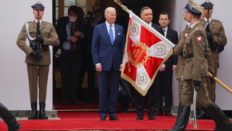 The two presidents stand outside the Presidential Palace in Warsaw