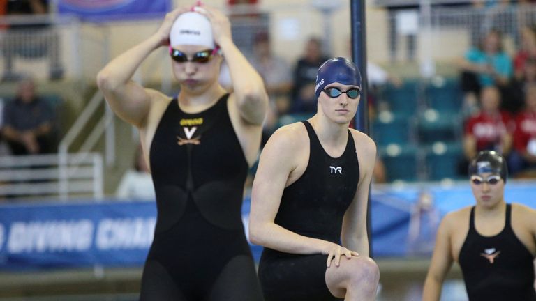 Lia Thomas looks towards Emma Weyant before the 500 freestyle final